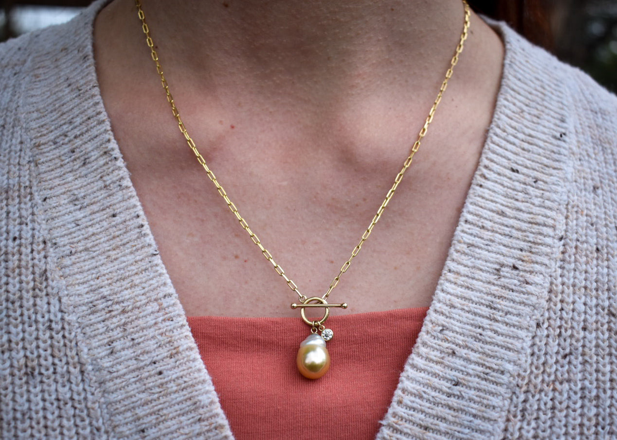 Yellow and White South Sea Pearl with Diamond Charm.