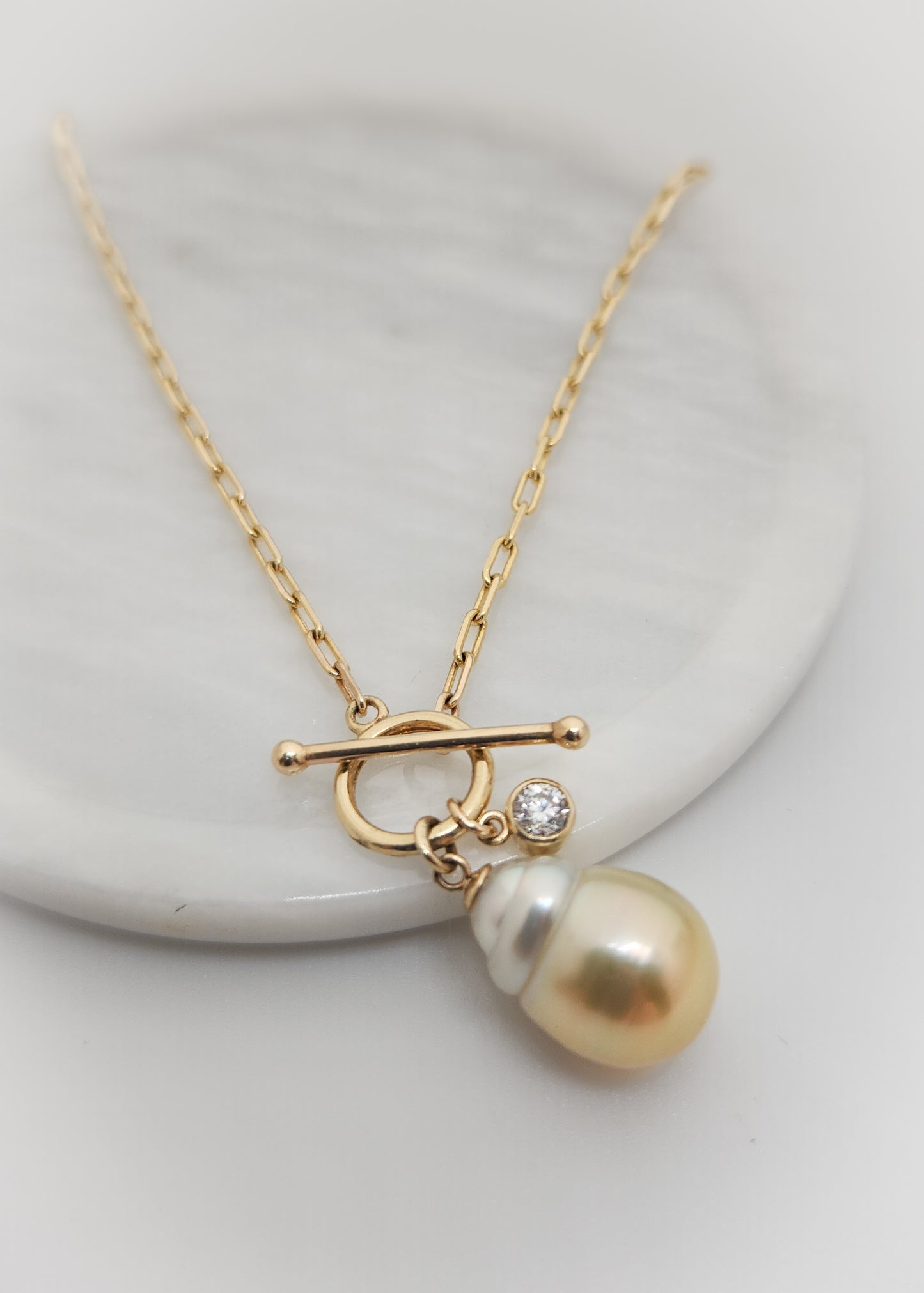 Yellow and White South Sea Pearl with Diamond Charm.