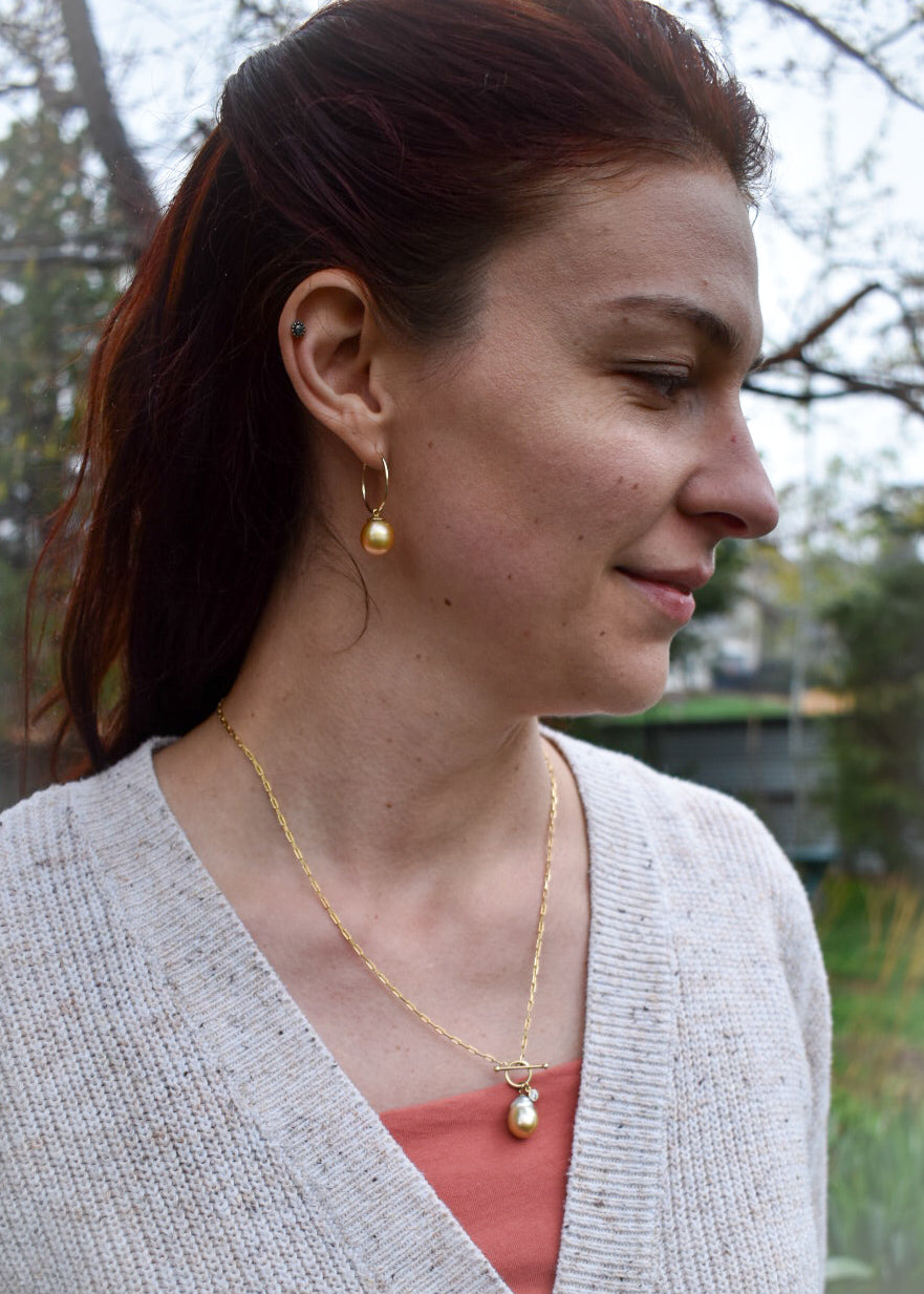 Yellow and White South Sea Pearl with Diamond Charm.